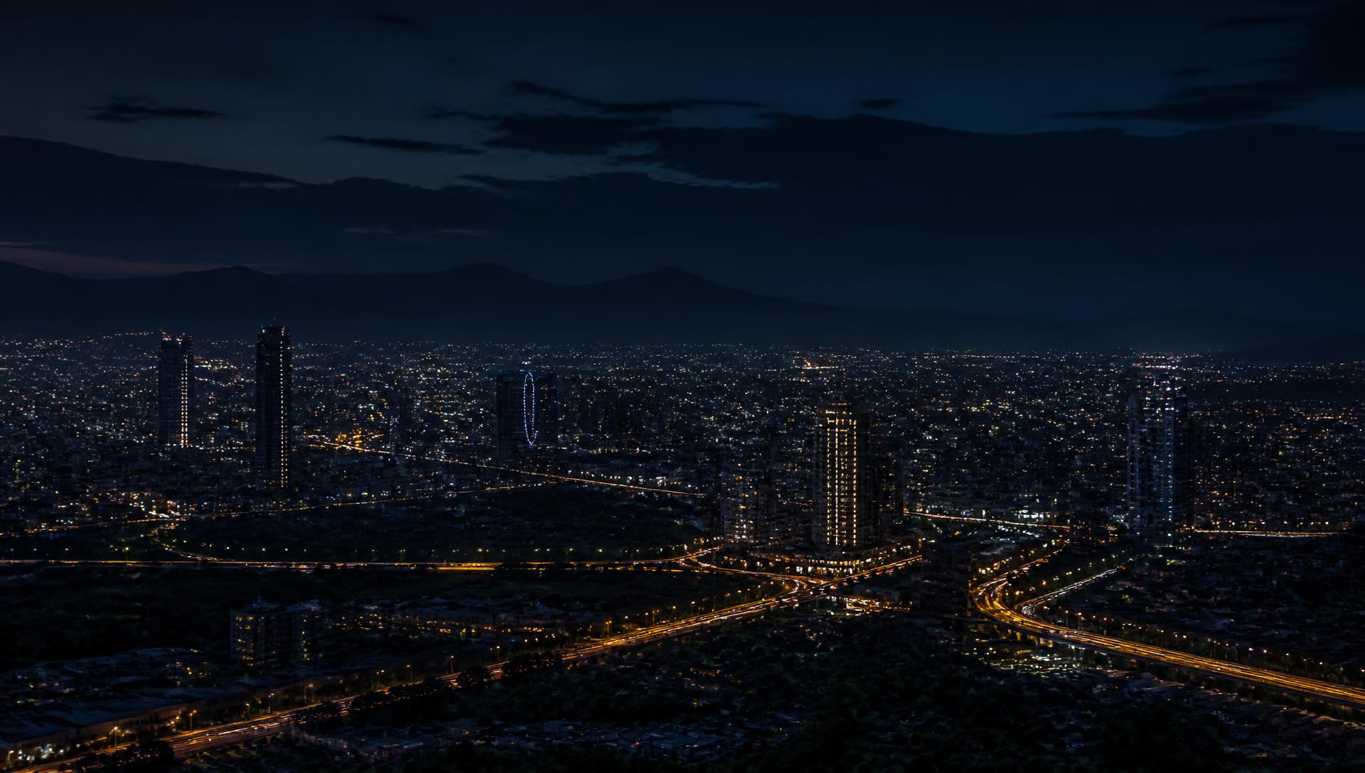 Addis Ababa city lights at night with mountains on the horizon